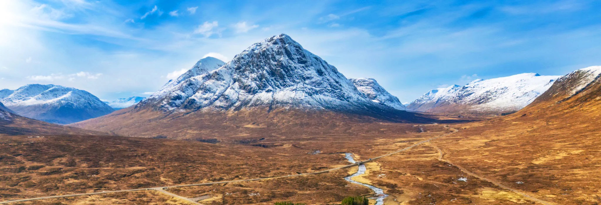 Rannoch Moor looking towards Buachaille Etive Mor, with a yellow marker picking out Tigh na Coille among the conifers below the mountain
